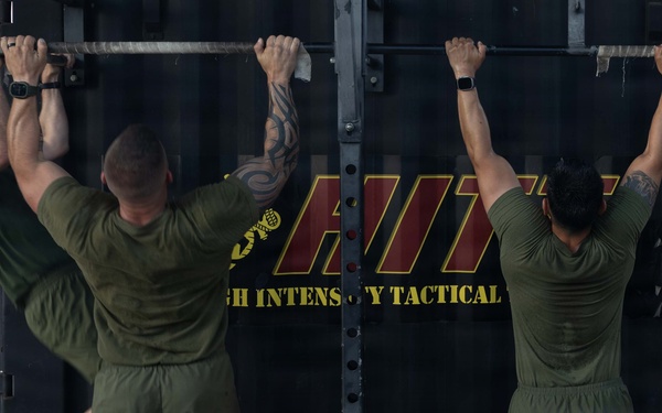 Marines attending 1st Sgts. Symposium Conduct physical training