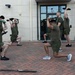 Marines attending 1st Sgts. Symposium Conduct physical training