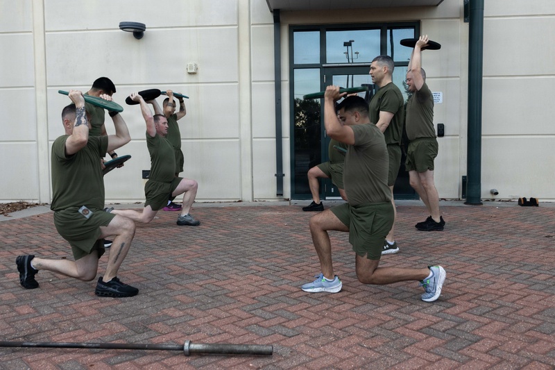 Marines attending 1st Sgts. Symposium Conduct physical training