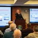 Vice Adm. Johnny Wolfe Jr. Addresses PAE SSP Workforce at Town Hall Event