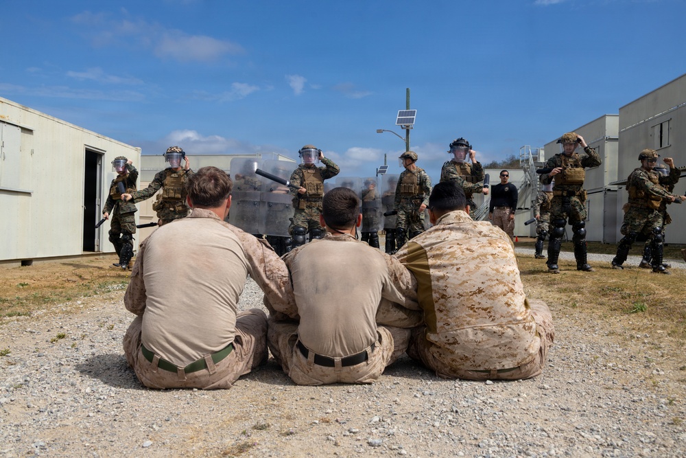 U.S. Marines with 2nd Bn., 5th Marines participate in non-lethal weapons course