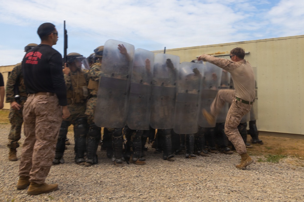 U.S. Marines with 2nd Bn., 5th Marines participate in non-lethal weapons course