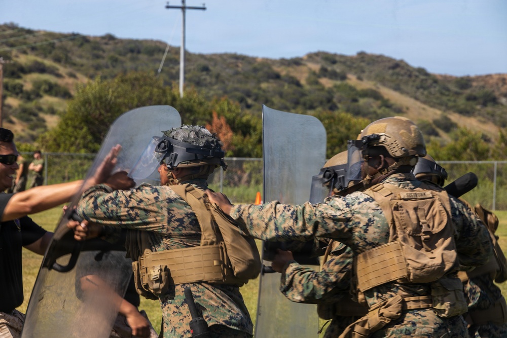 U.S. Marines with 2nd Bn., 5th Marines, participate in non-lethal weapons course