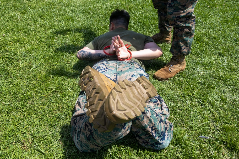 U.S. Marines with 2nd Bn., 5th Marines, participate in non-lethal weapons course