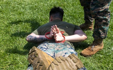 U.S. Marines with 2nd Bn., 5th Marines, participate in non-lethal weapons course