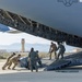 Loadmasters and Logistics Specialists prepare a C-17 for a Mission Readiness Exercise at Edwards Air Force Base