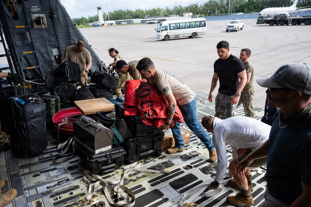 9th AS transports Seabee equipment to INDO-PACOM