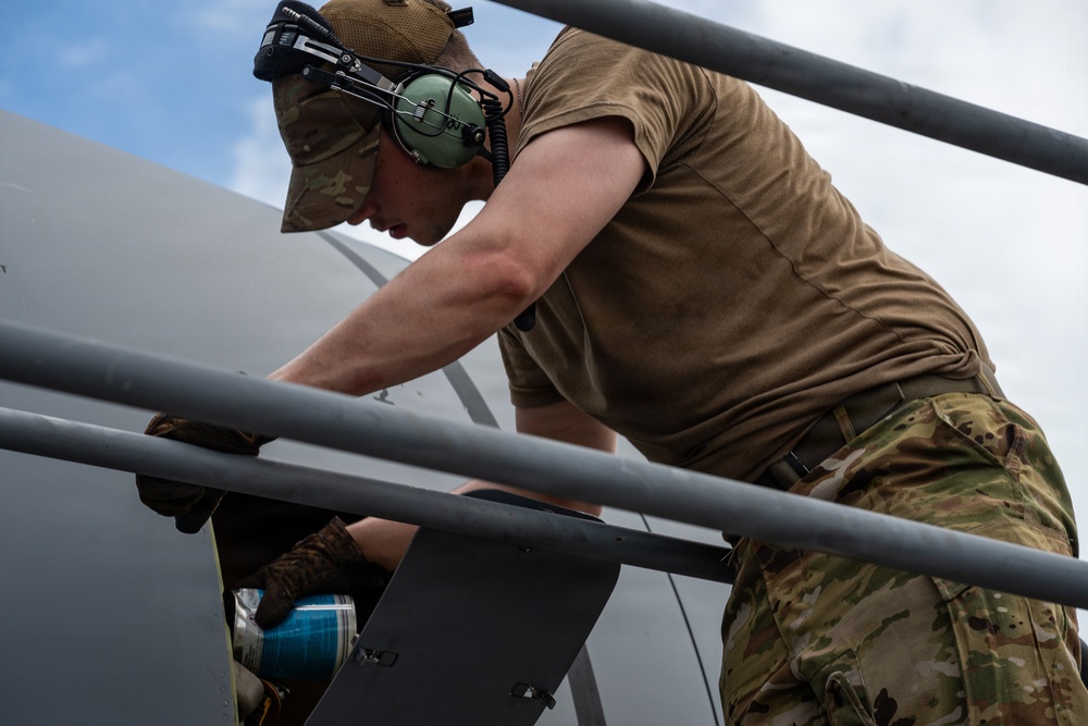9th AS transports Seabee equipment to INDO-PACOM