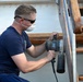 Coast Guard Cutter Eagle crew members conduct vessel upkeep