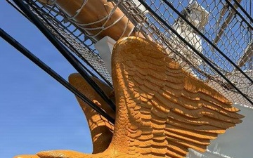 Coast Guard Cutter Barque Eagle's repaired figurehead affixed to cutter's bow