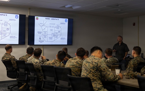 Exercise Garnet Rattler: U.S. Marines conduct range safety brief, F-15E Strike Eagle familiarization, CASEVAC ROC walk