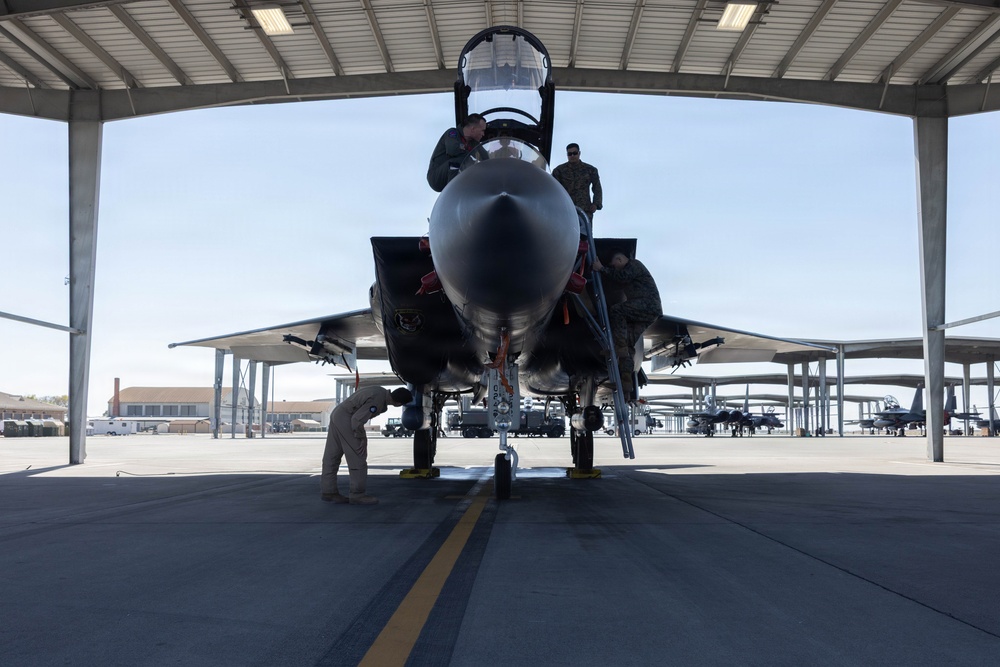 Exercise Garnet Rattler: U.S. Marines conduct range safety brief, F-15E Strike Eagle familiarization, CASEVAC ROC walk