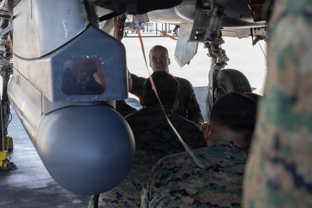 Exercise Garnet Rattler: U.S. Marines conduct range safety brief, F-15E Strike Eagle familiarization, CASEVAC ROC walk