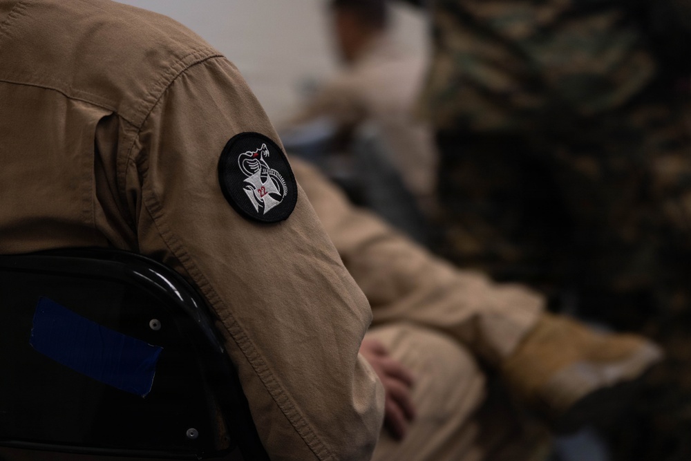 Exercise Garnet Rattler: U.S. Marines conduct range safety brief, F-15E Strike Eagle familiarization, CASEVAC ROC walk
