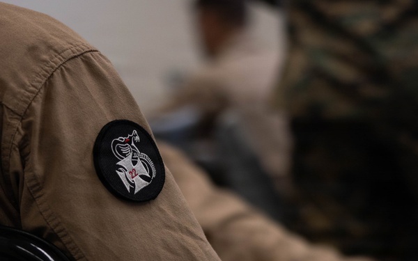Exercise Garnet Rattler: U.S. Marines conduct range safety brief, F-15E Strike Eagle familiarization, CASEVAC ROC walk
