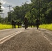 Multinational Soldiers hike Kolekole Pass at the 2026 Pacific Land Forces Team Readiness Challenge