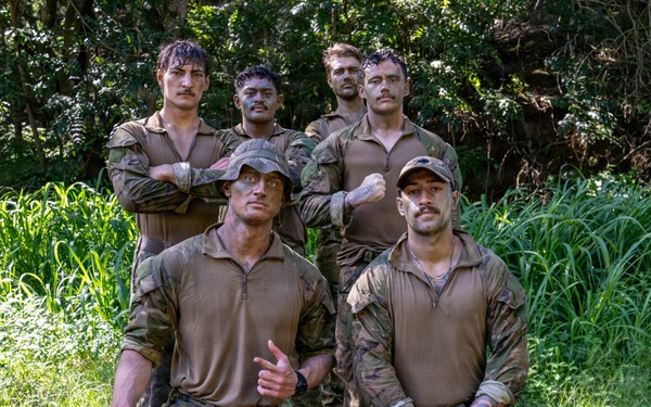 Multinational Soldiers hike Kolekole Pass at the 2026 Pacific Land Forces Team Readiness Challenge