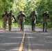 Multinational Soldiers hike Kolekole Pass at the 2026 Pacific Land Forces Team Readiness Challenge