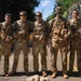 Multinational Soldiers hike Kolekole Pass at the 2026 Pacific Land Forces Team Readiness Challenge
