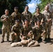 Multinational Soldiers hike Kolekole Pass at the 2026 Pacific Land Forces Team Readiness Challenge