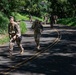 Multinational Soldiers hike Kolekole Pass at the 2026 Pacific Land Forces Team Readiness Challenge
