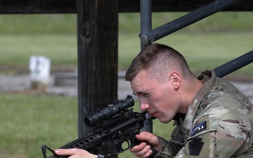 Region II Best Warrior Competitors zero their M4 carbine rifles