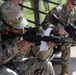 Region II Best Warrior Competitors zero their M4 carbine rifles