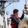 USS Mitscher (DDG 57) Sailor secures hoist during boat operations