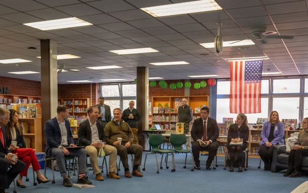 Community Leaders Gather for Round-Table Discussion in School Library