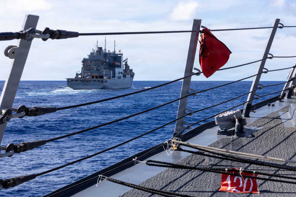 USS Mustin conducts a replenishment-at-sea