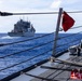 USS Mustin conducts a replenishment-at-sea