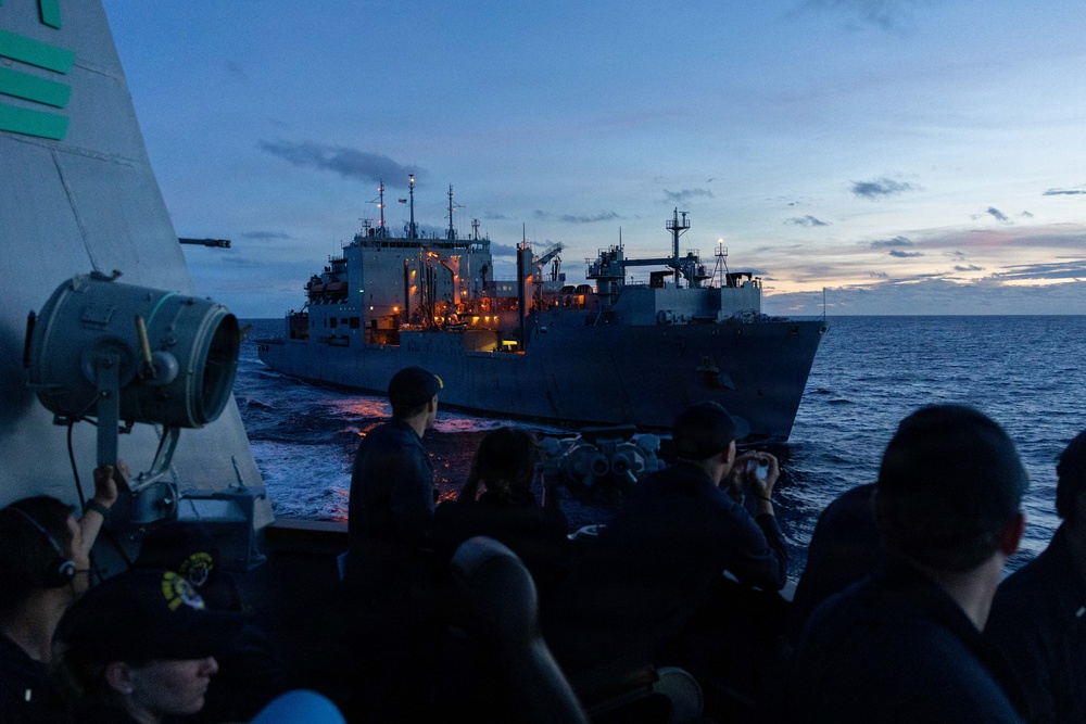 USS Mustin conducts a replenishment-at-sea