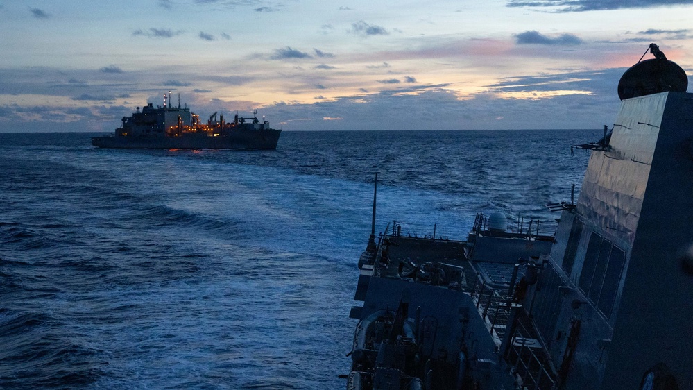 USS Mustin conducts a replenishment-at-sea
