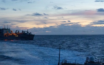 USS Mustin conducts a replenishment-at-sea