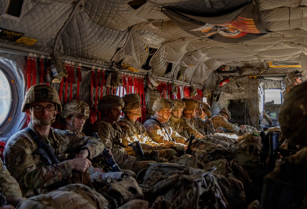 Eighth Army Soldiers fly in CH-47 Chinook during Best Squad Competition