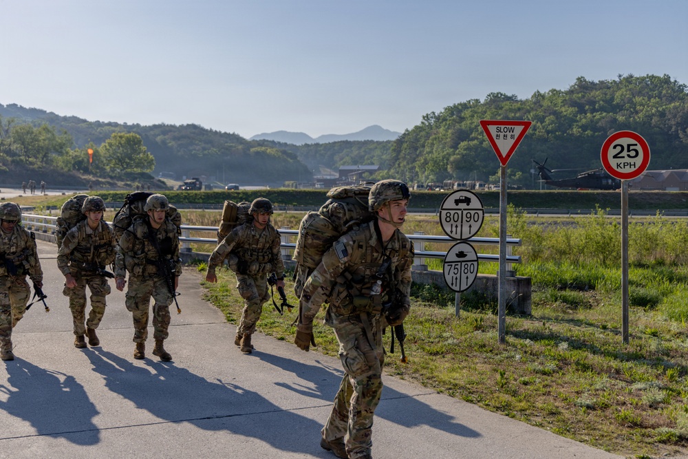 Soldiers tackle a Ruck March during Best Squad competition