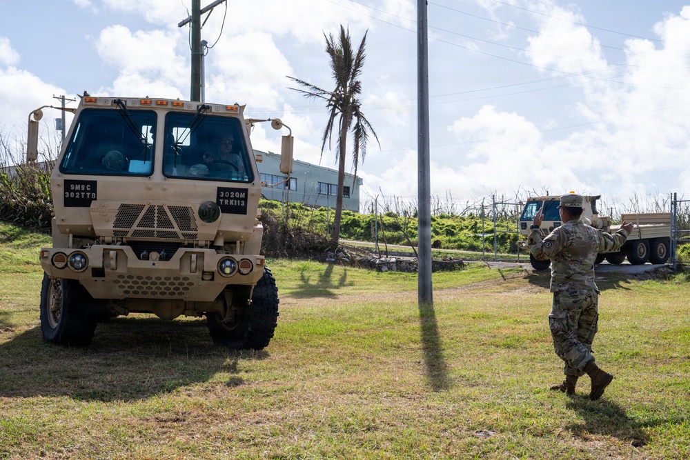 Sailors and Soldiers construct temporary shelters for Saipan residents affected by Super Typhoon Sinlaku