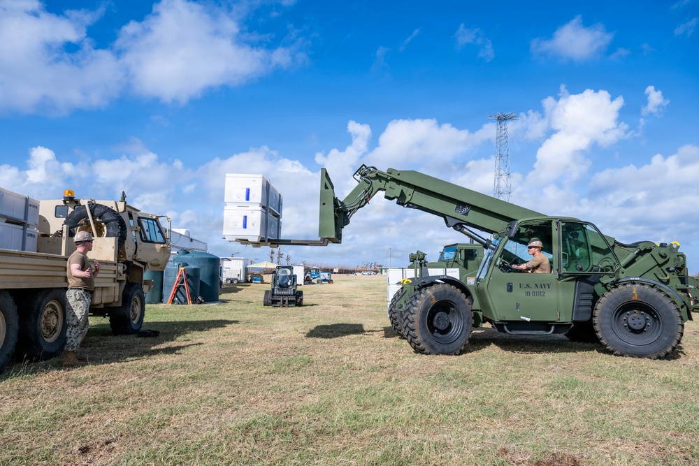 Sailors and Soldiers construct temporary shelters for Saipan residents affected by Super Typhoon Sinlaku
