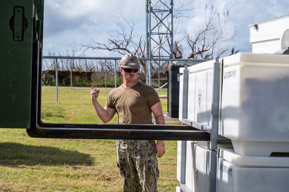Sailors and Soldiers construct temporary shelters for Saipan residents affected by Super Typhoon Sinlaku