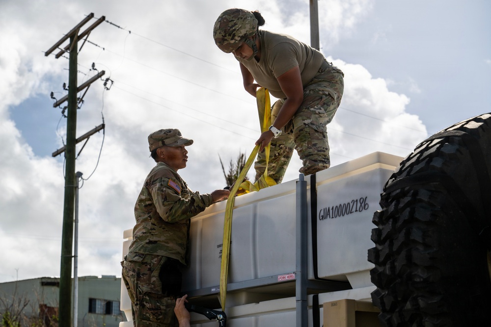Sailors and Soldiers construct temporary shelters for Saipan residents affected by Super Typhoon Sinlaku