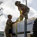Sailors and Soldiers construct temporary shelters for Saipan residents affected by Super Typhoon Sinlaku