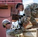 Sailors and Soldiers construct temporary shelters for Saipan residents affected by Super Typhoon Sinlaku