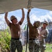 Sailors and Soldiers construct temporary shelters for Saipan residents affected by Super Typhoon Sinlaku