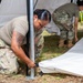 Sailors and Soldiers construct temporary shelters for Saipan residents affected by Super Typhoon Sinlaku