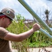 Sailors and Soldiers construct temporary shelters for Saipan residents affected by Super Typhoon Sinlaku