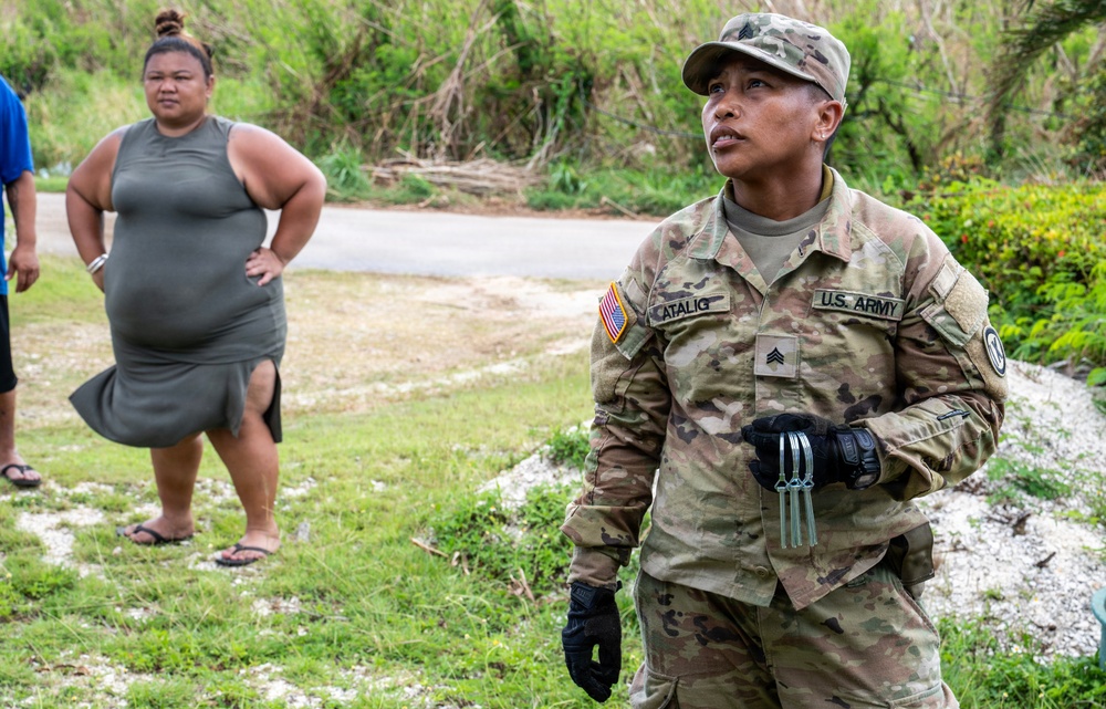 Sailors and Soldiers construct temporary shelters for Saipan residents affected by Super Typhoon Sinlaku