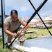 Sailors and Soldiers construct temporary shelters for Saipan residents affected by Super Typhoon Sinlaku
