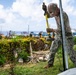 Sailors and Soldiers construct temporary shelters for Saipan residents affected by Super Typhoon Sinlaku