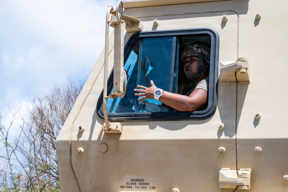 Sailors and Soldiers construct temporary shelters for Saipan residents affected by Super Typhoon Sinlaku