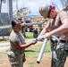 Sailors and Soldiers construct temporary shelters for Saipan residents affected by Super Typhoon Sinlaku